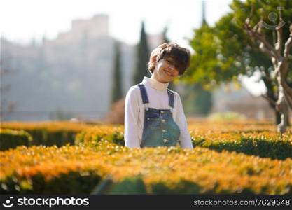 Eight-year-old girl having fun in an urban park in Granada. Eight-year-old girl having fun in an urban park