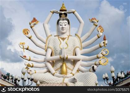 Eighteen arms Buddha over blue sky, Koh Samui. Thailand