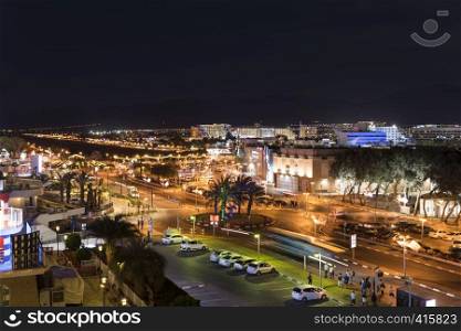 Eilat,Israel,20-march-2019:Night panoramic view on central public beach of Eilat - the southernmost port and famous resort and recreational city in Israel. Israel city eilat skyline by night