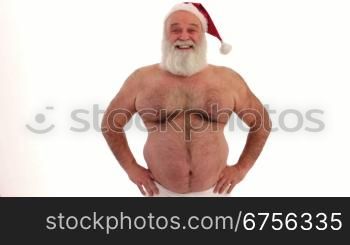 Ein etwas verrnckter Weihnachtsmann mit nacktem Oberk?rper und Weihnachtsmannmntze.Freaky Santa with white beard - real character.