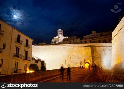Eivissa Ibiza town with night moon castle entrance and Church
