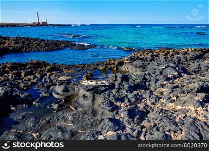 El Cotillo beach and Toston lighthouse at Fuerteventura Canary Islands