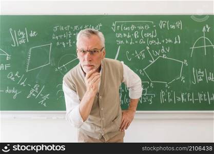 elder professor classroom looking camera with question