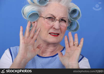 Elder upset with curlers in her hair