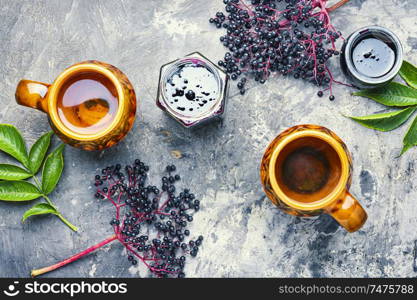 Elderberry jam and fresh berries.Homemade pozzy.Flat lay. Elderberry autumn jam