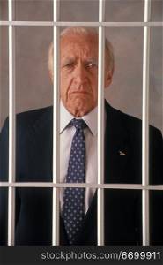 Elderly Businessman In Jail Cell