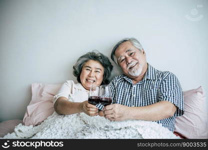 Elderly couple anniversary in bed room