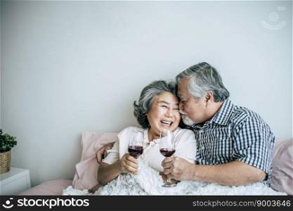 Elderly couple anniversary in bed room