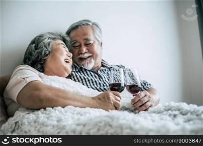 Elderly couple anniversary in bed room