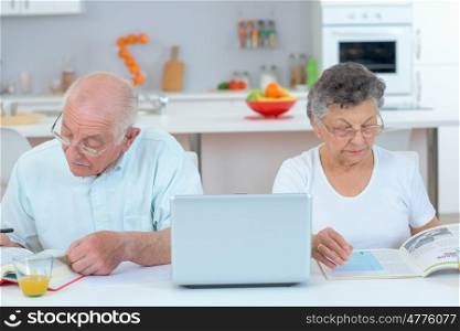 elderly couple apart