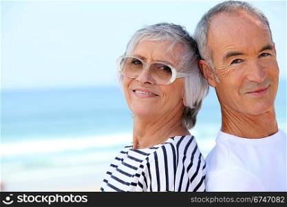 Elderly couple at the beach together