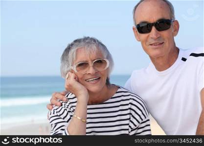 Elderly couple by the seaside