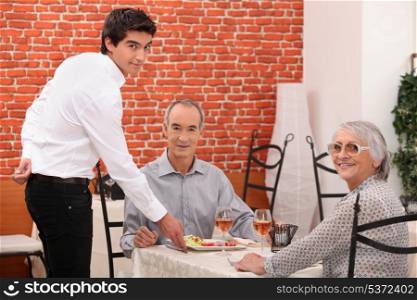 Elderly couple dining