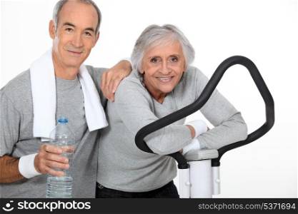 elderly couple doing sport