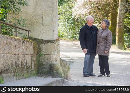 Elderly couple enjoying a walk together