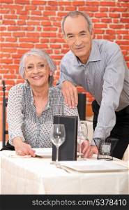 Elderly couple in restaurant