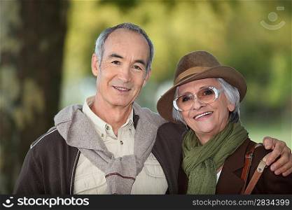 Elderly couple on an autumnal walk