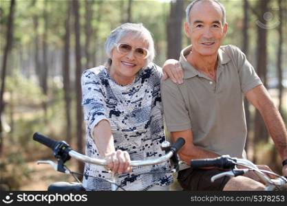 Elderly couple on bike ride