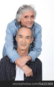 Elderly couple on white background