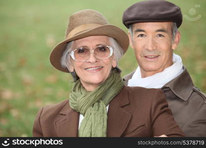 Elderly couple out for a stroll on a Sunday afternoon