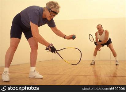 Elderly Couple Playing Racquetball