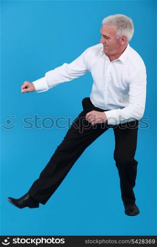 Elderly man dancing