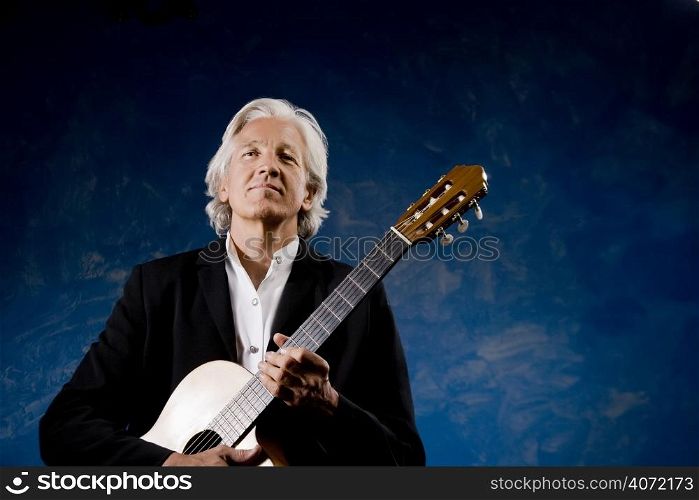 Elderly man with a guitar
