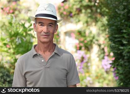 Elderly man with hat