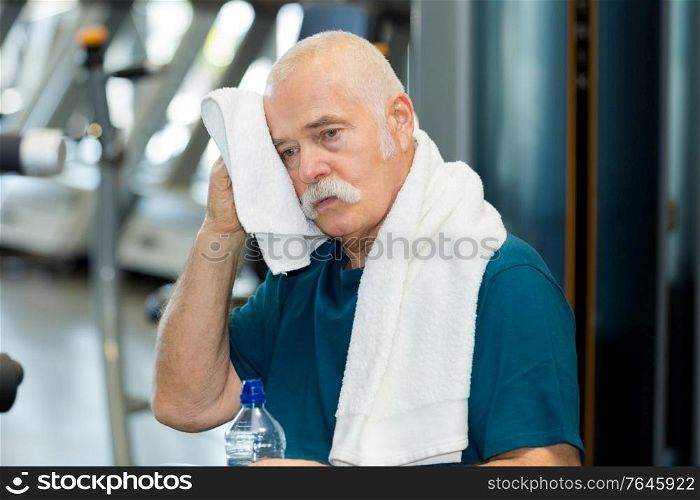 elderly man working out