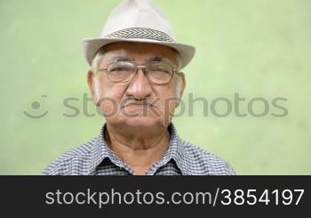 Elderly people portrait, three old male friends looking at camera. Sequence