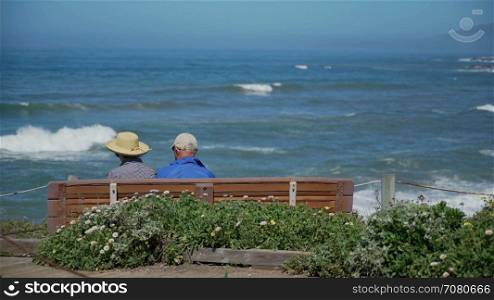 Elderly retires enjoy view of ocean
