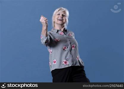 elderly woman celebrating