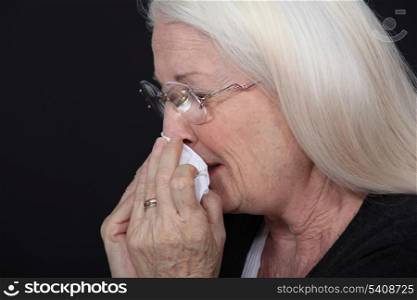elderly woman crying