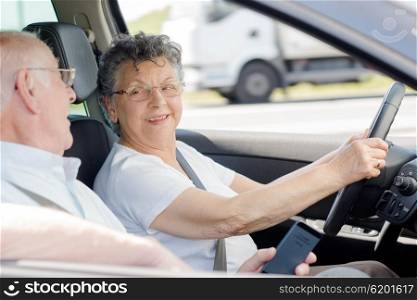 elderly woman driving