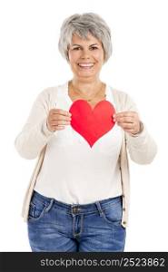 Elderly woman holding a heart shape in her hands, isolated on white background