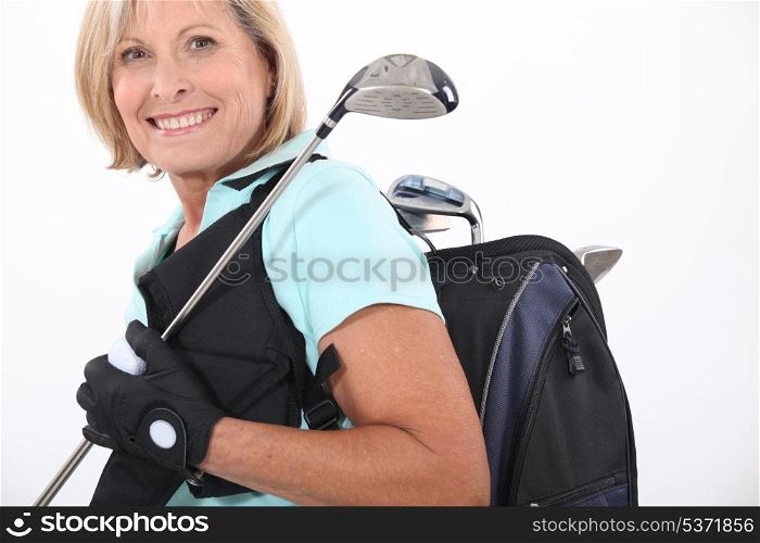 elderly woman liking golf