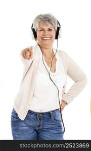 Elderly woman listen music with headphones, isolated over white background