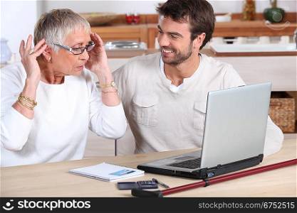 elderly woman using computer