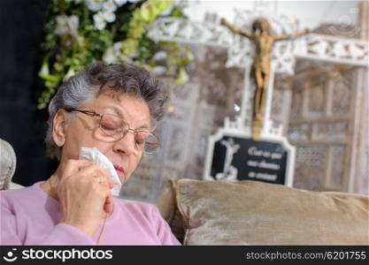 elderly woman weeping
