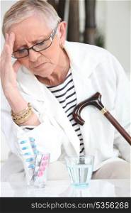 Elderly woman with a headache