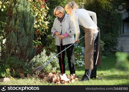 Elderly woman with her gardener