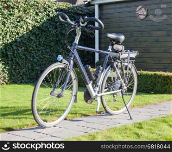 Electric bicycle in the sun, modern bike mostly used by seniors