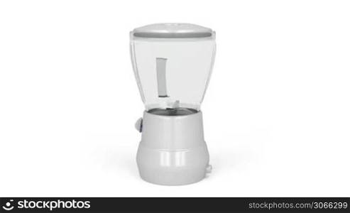 Electric blender rotates on white background