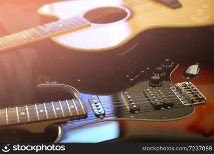 Electric guitar and acoustic guitar , close up