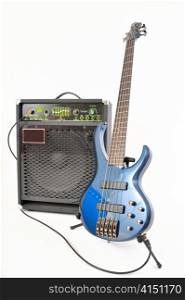 Electric guitar and amplifier isolated on a white