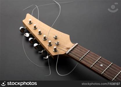 Electric guitar headstock and tuning machines. Macro view