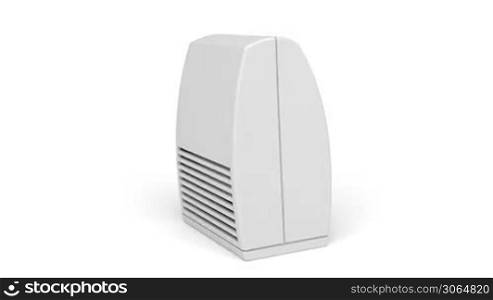Electric heater rotates on white background