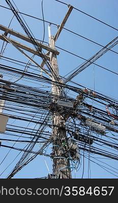 Electric high voltage power poles on the island of Phuket in Thailand