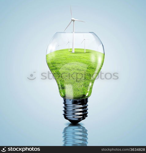 Electric light bulb and wind meels inside it as symbol of green energy