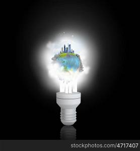 Electric light bulb. Light bulb glowing icon on dark background. Elements of this image are furnished by NASA